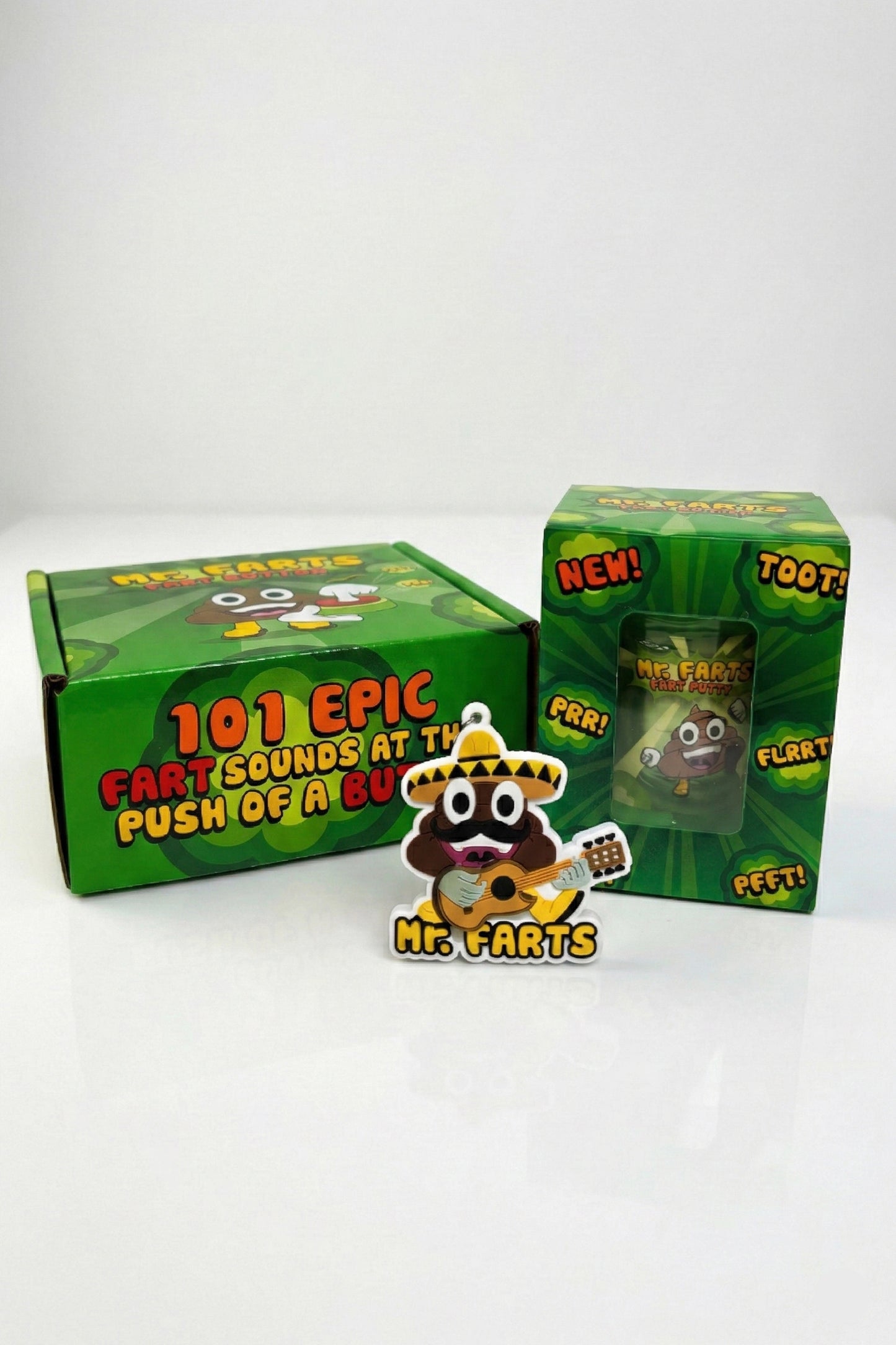 mr farts fart bundle including fart button on back showing '101 epic farts sounds at the push of a button' on the box, fart putty in custom packaging and exclusive Taco Farts key ring on a white background