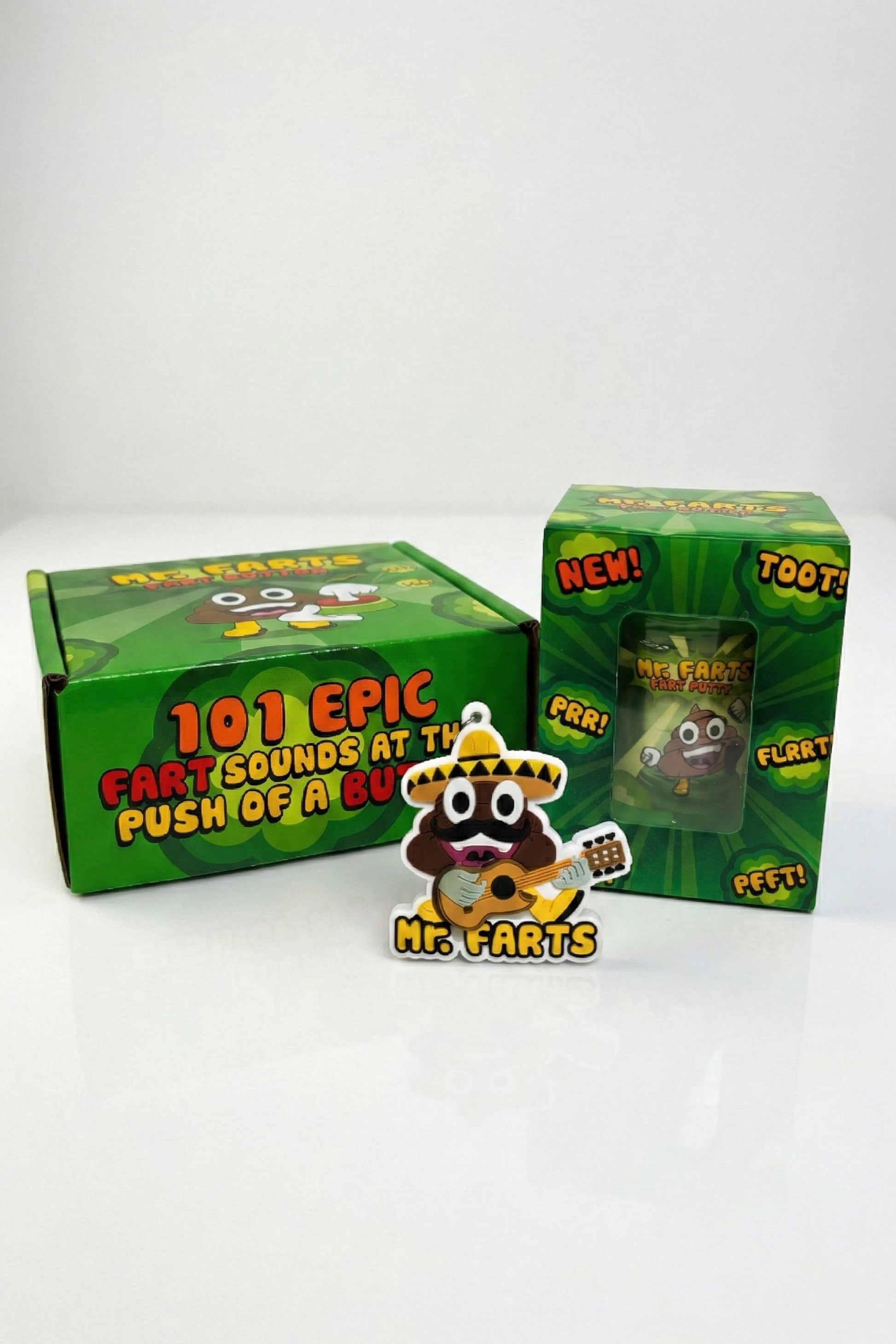 mr farts fart bundle including fart button on back showing '101 epic farts sounds at the push of a button' on the box, fart putty in custom packaging and exclusive Taco Farts key ring on a white background